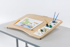 artwork drawing board with stationary on